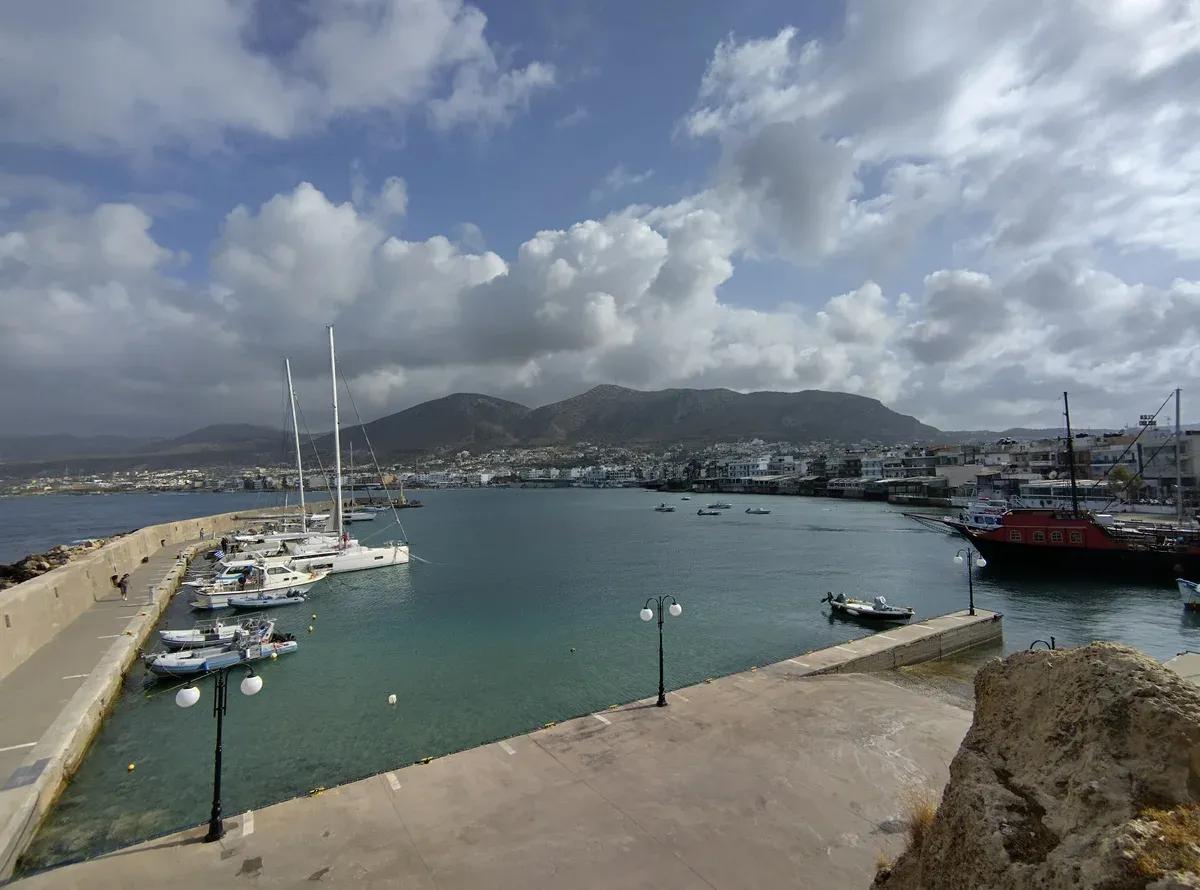 Fishing boats and sailboats in the old harbour at Limenas Chersonisou, the original heart of Hersonissos, Crete