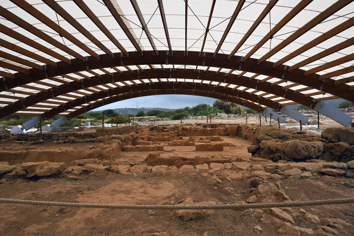 Excavated ruins of the Minoan palace at Malia, Crete, under its protective shelter
