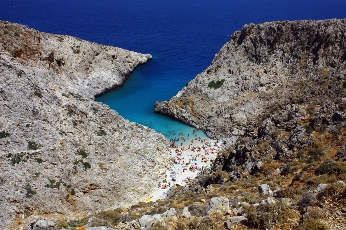 Seitan Limania's narrow turquoise cove between pale cliffs on the Akrotiri peninsula, Crete